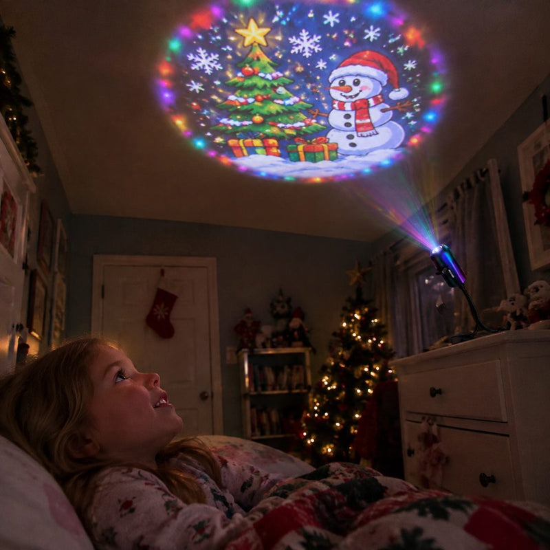 Girl in bed watching a Christmas projection on the ceiling